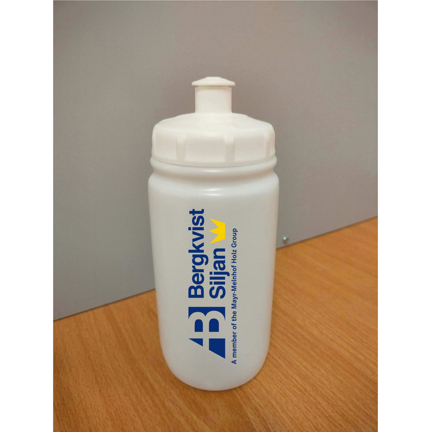 Flaska med vitt lock